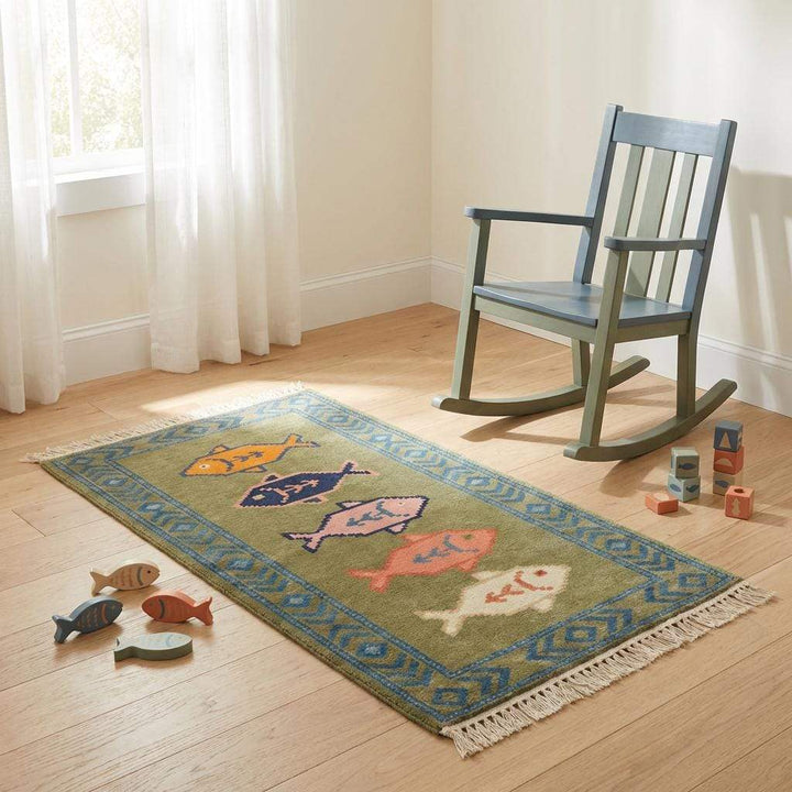Translation missing: es.Decorative fish motif hand knotted rug adding character to narrow spaces
