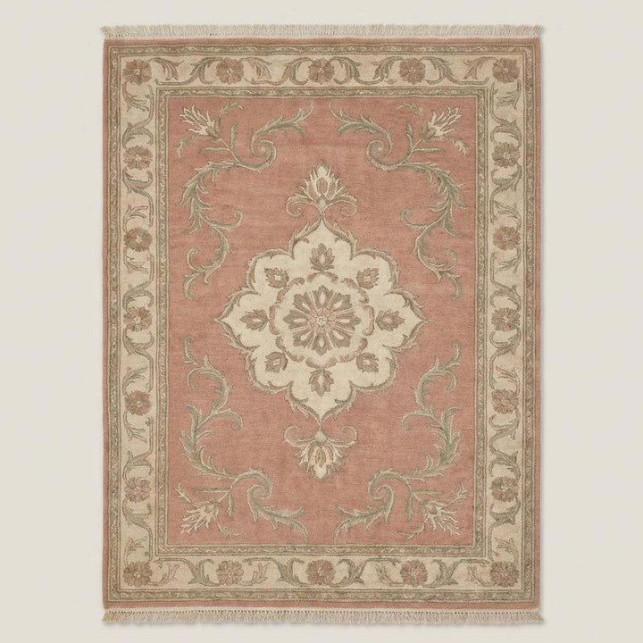 Translation missing: en.Floral hand knotted rug styled in living room with wooden floor and neutral furniture
