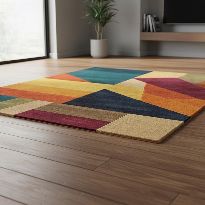 Translation missing: en.Colorful geometric area rug with triangle patchwork pattern in vibrant modern hues