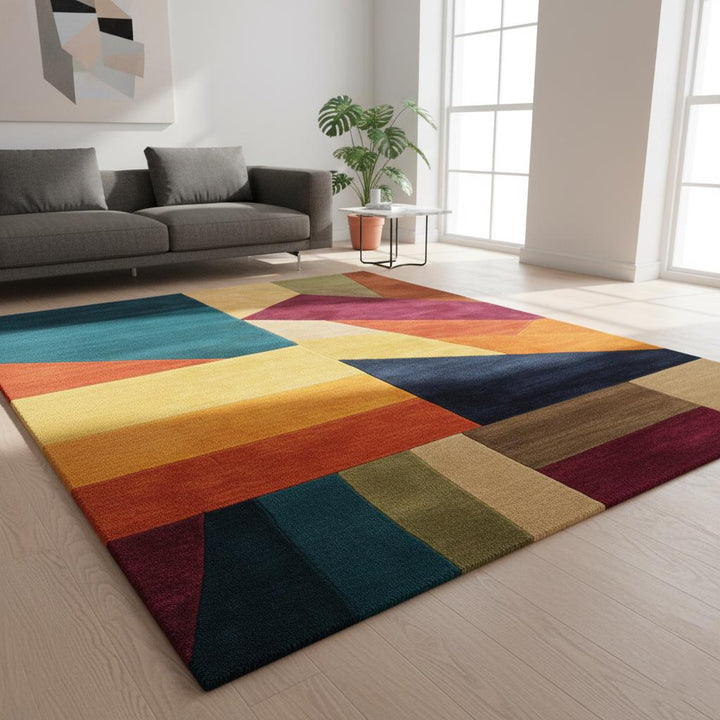 Translation missing: en.Colorful geometric area rug with triangle patchwork design and plush texture