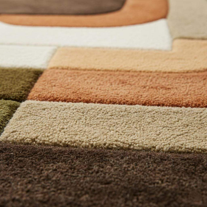 Translation missing: en.Mid century modern rug with olive green and rust orange geometric tufted design for boho retro decor