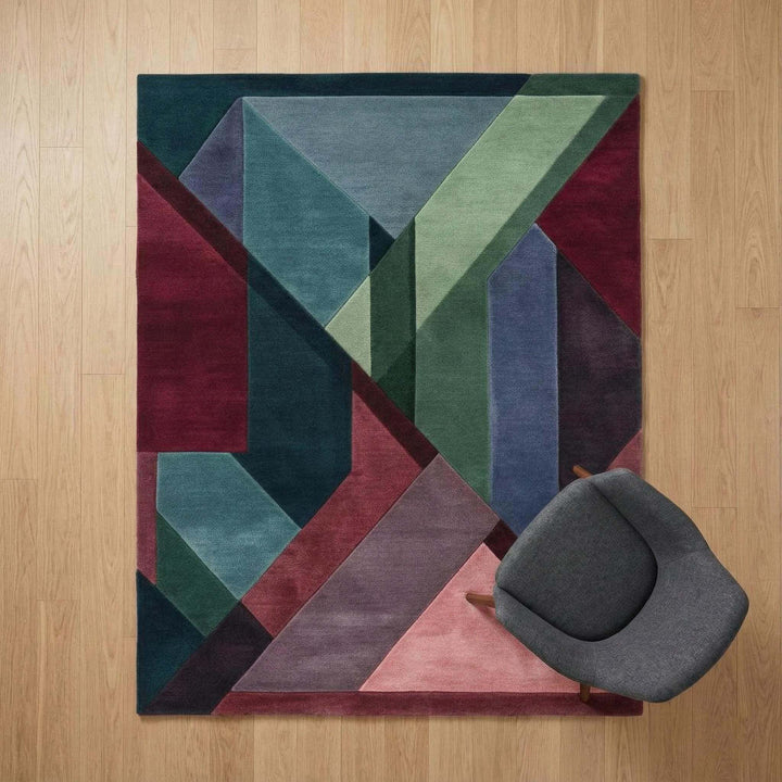 Translation missing: en.Geometric Art Deco area rug with burgundy, teal, and green color blocks in bold shapes