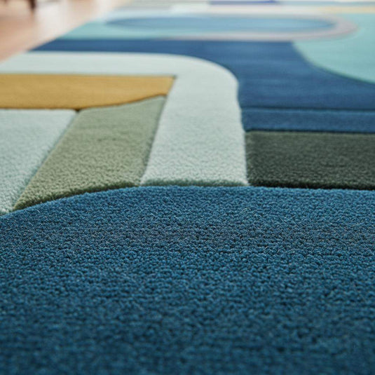 Translation missing: es.Contemporary living room rug in blue, teal, and olive green