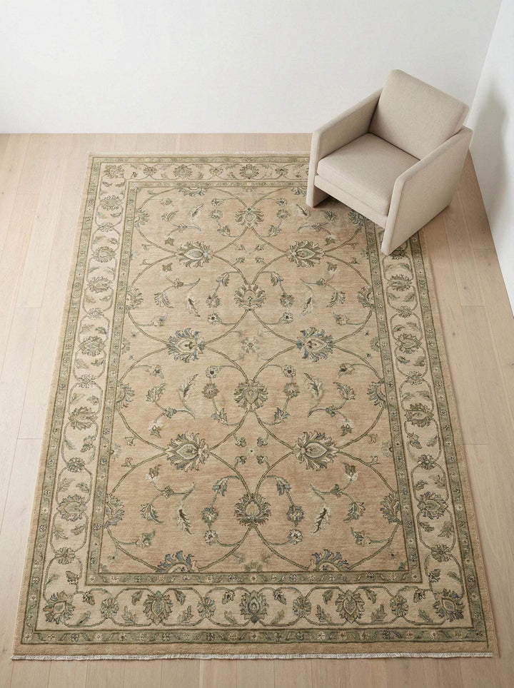 Translation missing: en.Hand-Knotted Oushak wool rug in muted sage green with floral pattern and natural wool texture