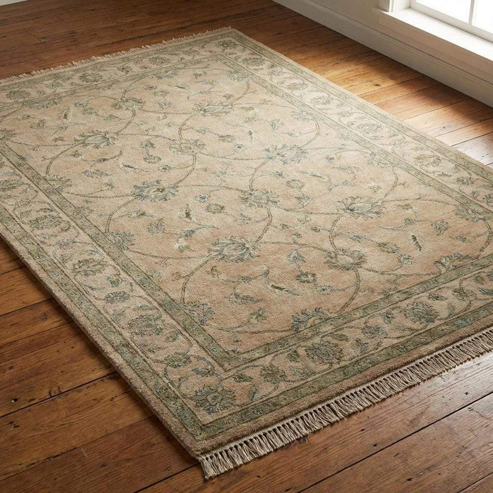 Translation missing: en.Detail of the hand-tied white fringe and finished edges of a genuine hand-knotted rug, highlighting the artisan construction