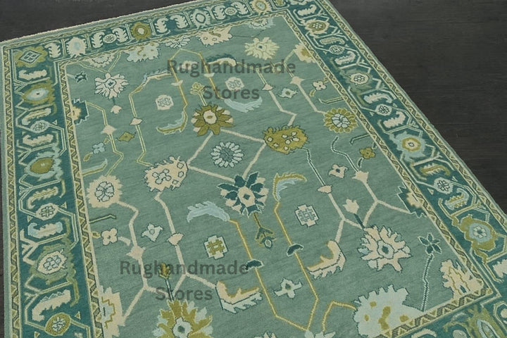 Translation missing: es.Vintage hand-knotted Oushak wool rug with green and blue floral design for living room decor