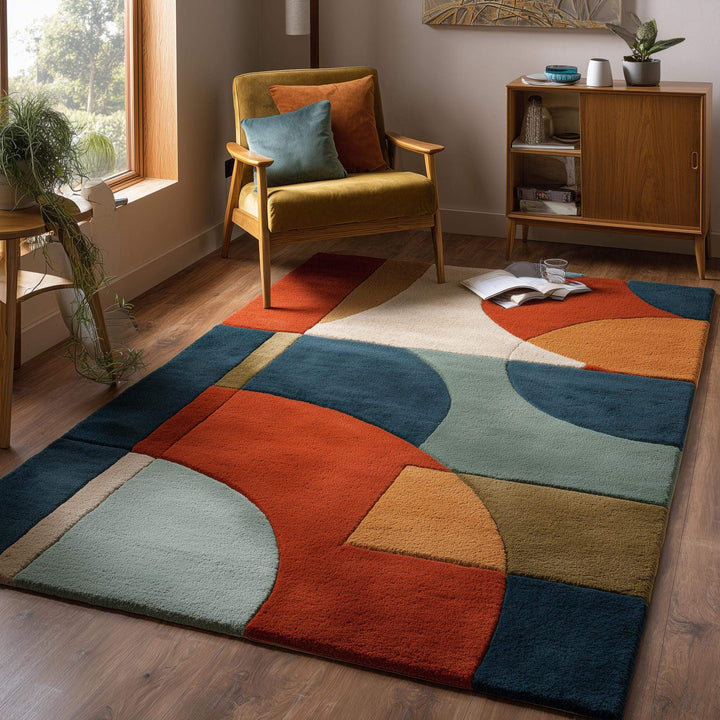 Translation missing: en.Hand tufted area rug with geometric burnt orange, teal, mustard, and sage tones in mid-century modern wool design