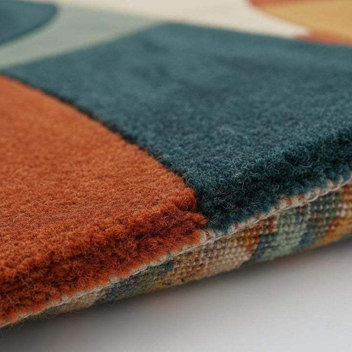 Translation missing: en.Hand tufted area rug with geometric mid-century modern design in burnt orange and complementary tones