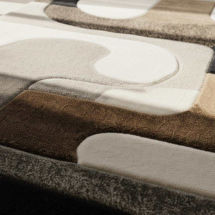 Translation missing: en.Hand tufted wool rug with abstract black and ivory geometric design and high-low texture