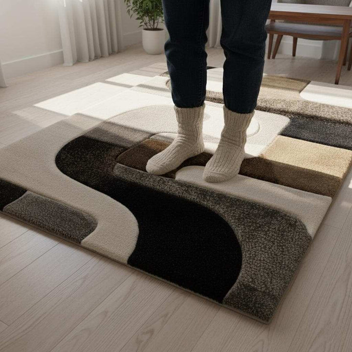 Translation missing: en.Hand tufted wool rug with abstract black geometric design on ivory background and high-low texture