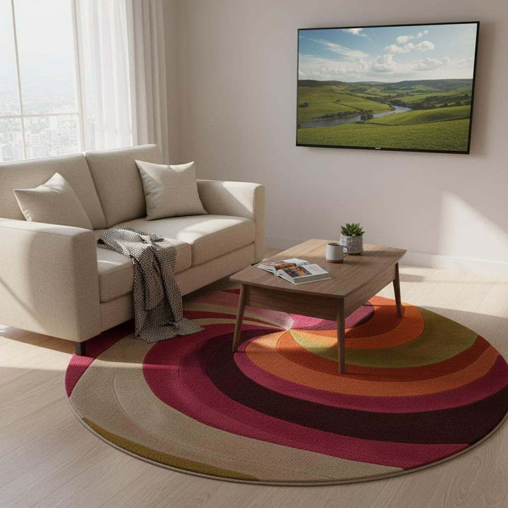 Translation missing: es.Colorful round area rug hand-tufted in wool, ideal as a statement living room rug or nursery centerpiece — warm magenta and coral tones