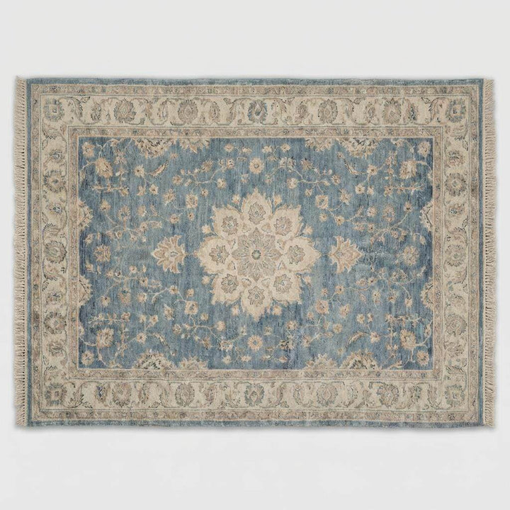 Translation missing: es.Hand knotted Turkish style rug with soft blue field and neutral detailing
