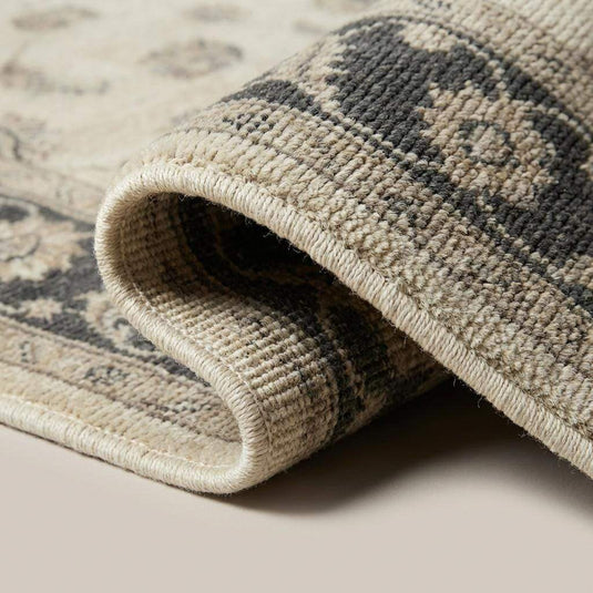 Translation missing: en.Close-up of hand knotted wool pile showing individual knots and soft natural texture
