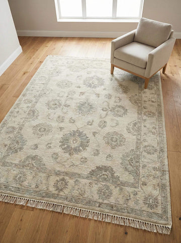 Translation missing: es.Hand knotted Oushak area rug with neutral floral wool design for living room