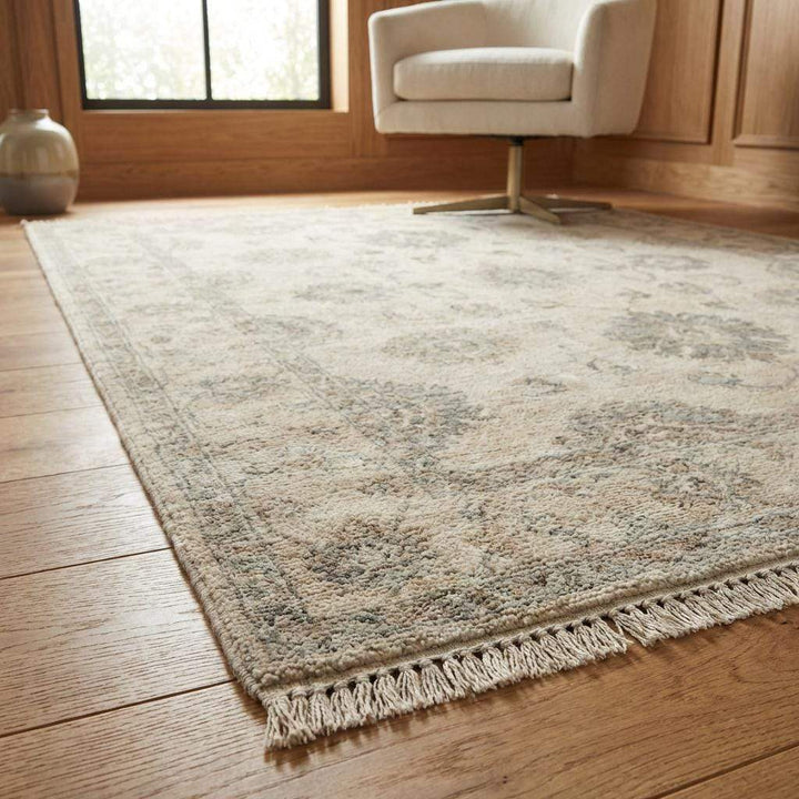Translation missing: en.Ivory and taupe wool area rug featuring classic Oushak inspired design