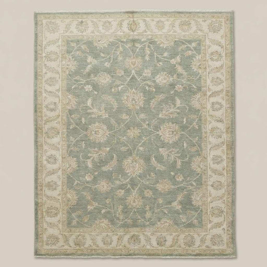 Translation missing: en.Traditional Oushak style rug with soft green field and ivory floral detailing