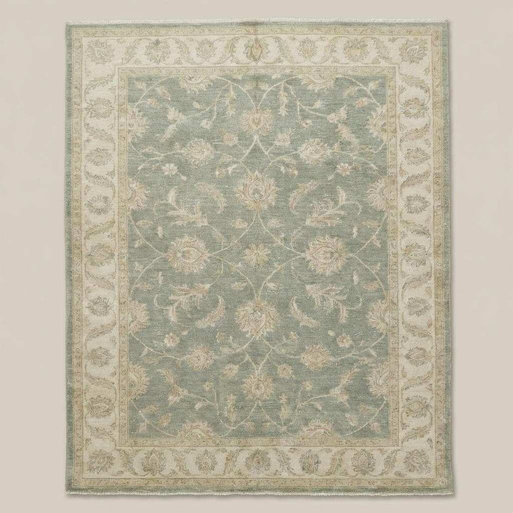 Translation missing: en.Traditional Oushak style rug with soft green field and ivory floral detailing