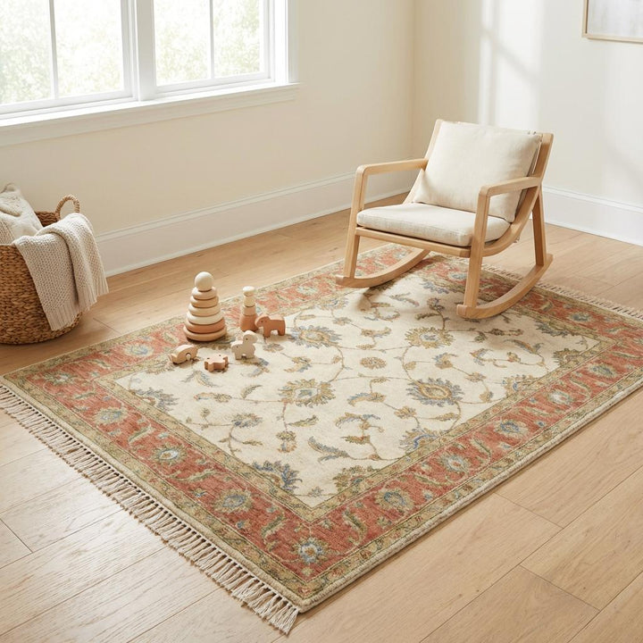Translation missing: en.Artisan crafted Turkish Oushak inspired wool carpet displaying soft beige field with blue and olive accents