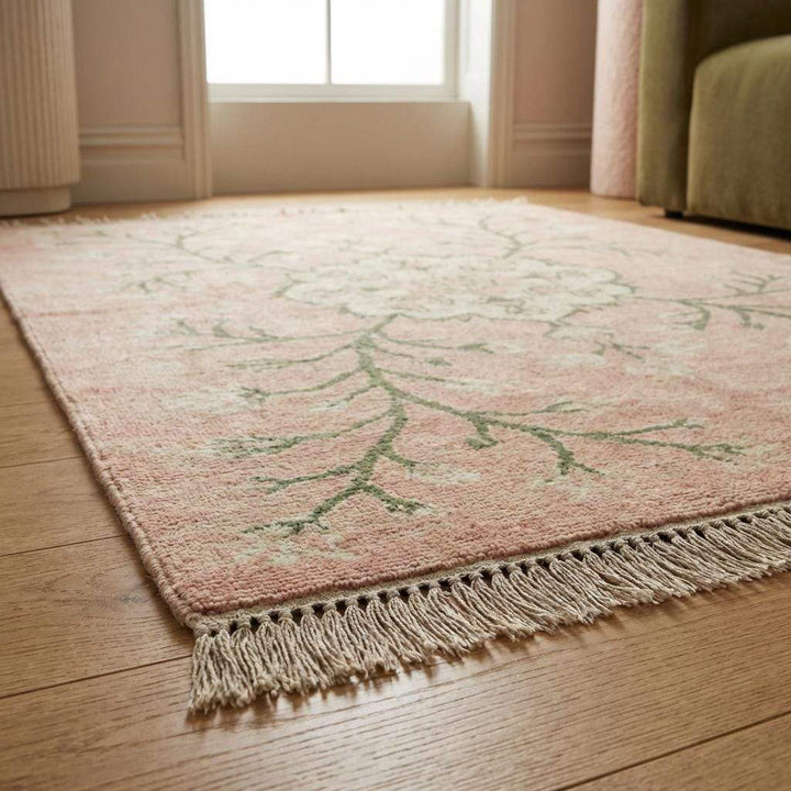 Translation missing: es.Traditional hand knotted wool rug featuring pastel pink field and botanical design