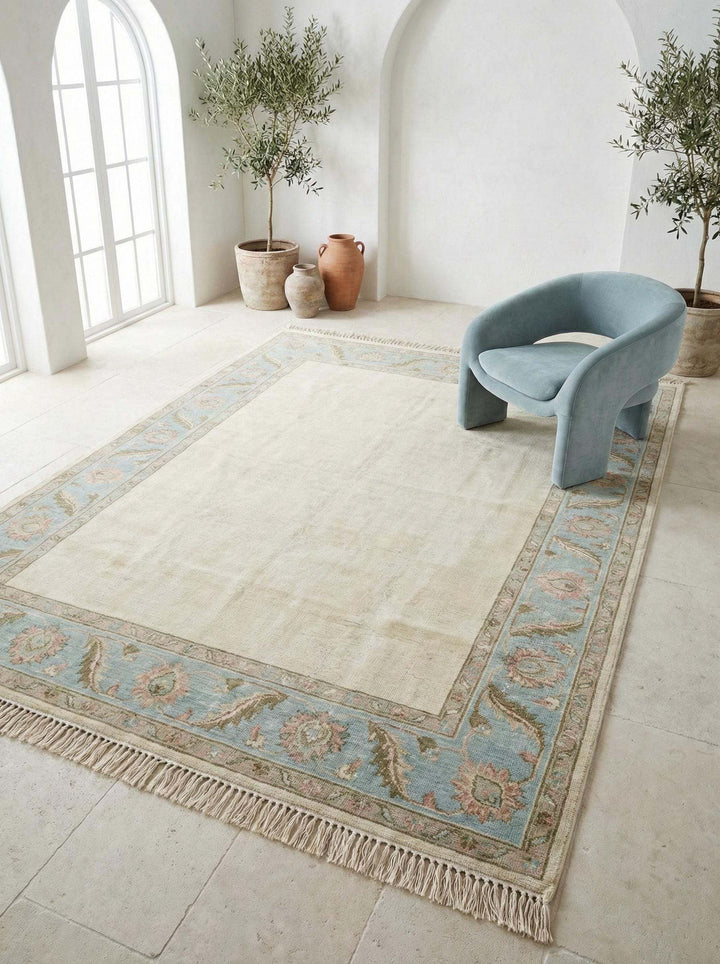 Translation missing: es.Hand Knotted Oushak Rug with ivory field and blue floral border, handmade wool Persian style area rug, soft neutral living room decor