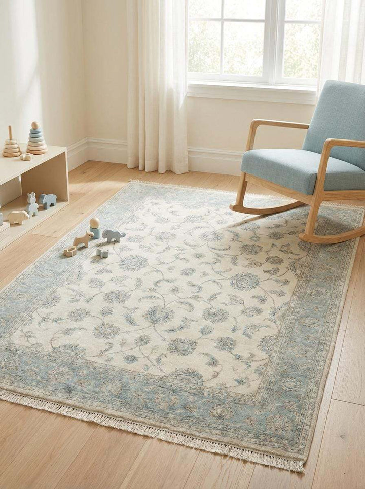 Translation missing: es.Persian-inspired Oushak rug with low pile wool construction and classic vine motifs
