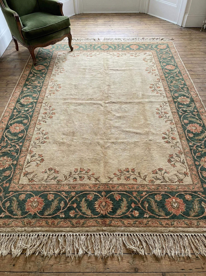 Translation missing: es.Hand knotted Oushak rug in muted sage green and cream wool with vintage floral design