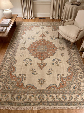 Translation missing: es.Hand knotted Oushak rug with floral medallion design in beige and terracotta tones styled in a neutral living room __etsy:7982646962