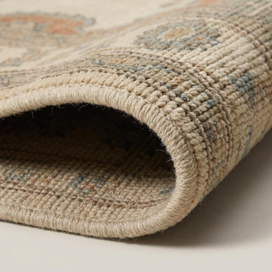 Translation missing: es.Close-up of wool texture showing hand knotted craftsmanship and soft cut pile detail in muted earth tones __etsy:8030592697