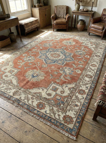 Translation missing: fr.Hand knotted Oushak rug in muted terracotta and blue with vintage medallion design