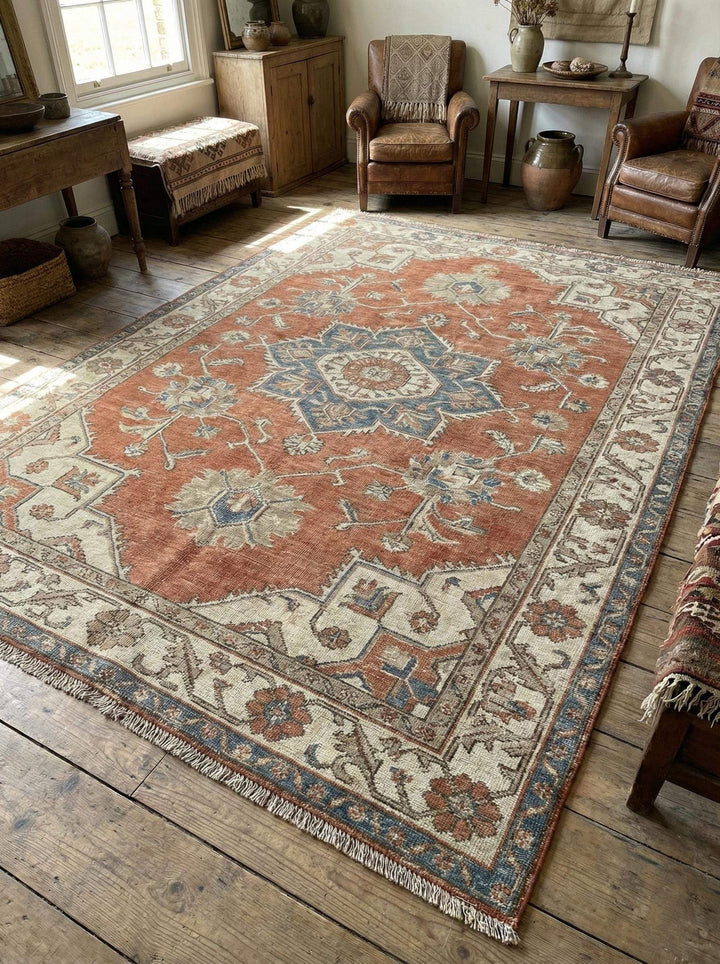 Translation missing: es.Hand knotted Oushak rug in muted terracotta and blue with vintage medallion design