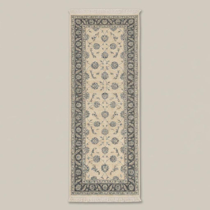 Translation missing: es.Traditional floral wool runner rug with muted blue border and ivory field