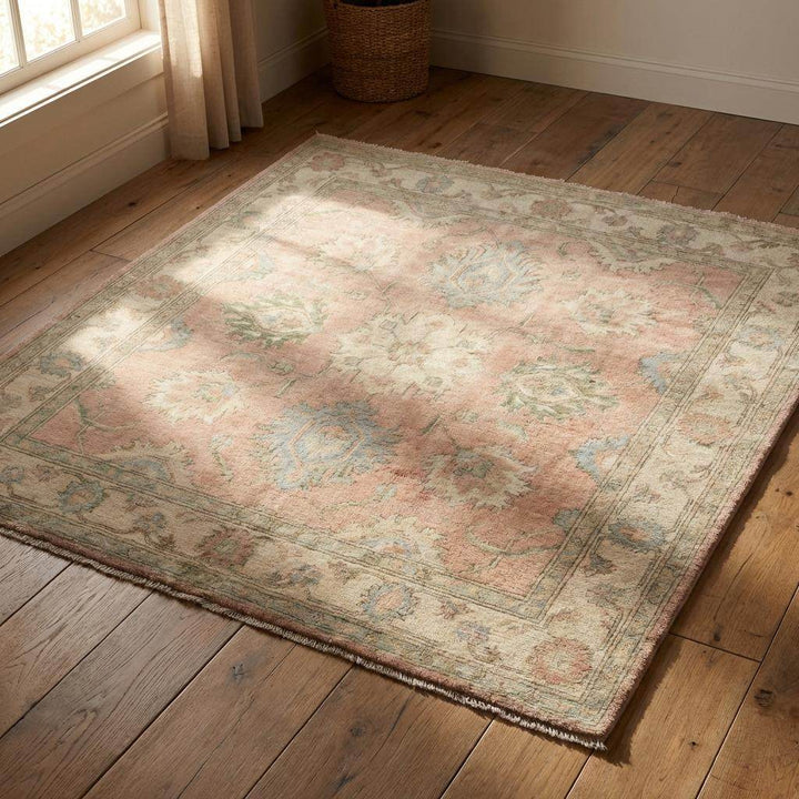 Translation missing: en.Artisan hand knotted rug craftsmanship showing traditional weaving quality and refined low pile finish
