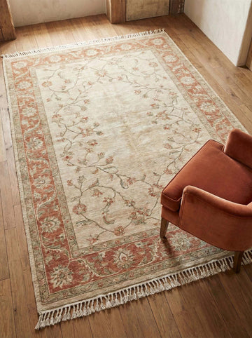 Translation missing: es.Hand knotted Oushak wool rug with soft floral neutral design in living room
