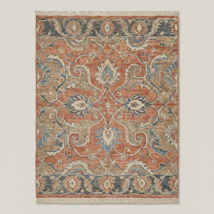 Translation missing: es.Vintage style Oushak rug featuring traditional floral pattern and muted earthy color palette