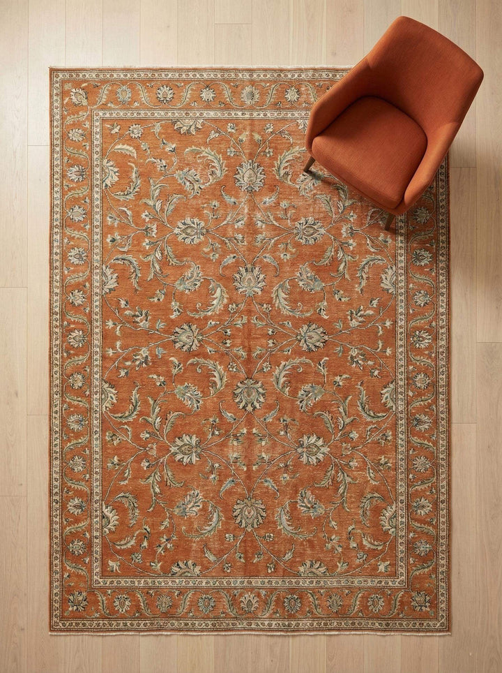 Translation missing: es.Hand knotted Oushak wool rug with terracotta rust floral design and low-pile finish