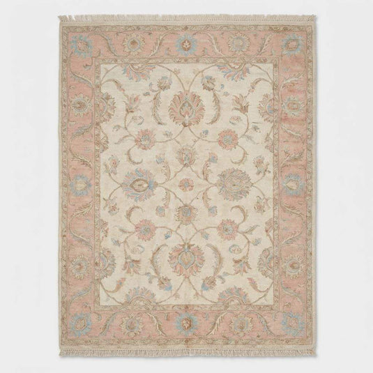 Translation missing: en.Traditional floral Oushak rug with pastel pink and blue accents on cream background