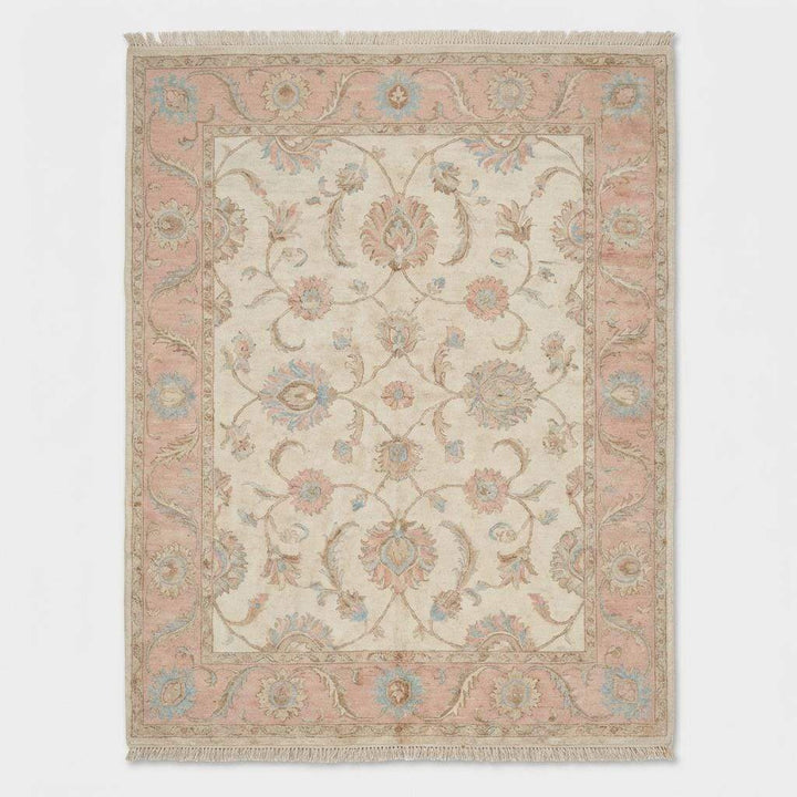 Translation missing: en.Traditional floral Oushak rug with pastel pink and blue accents on cream background
