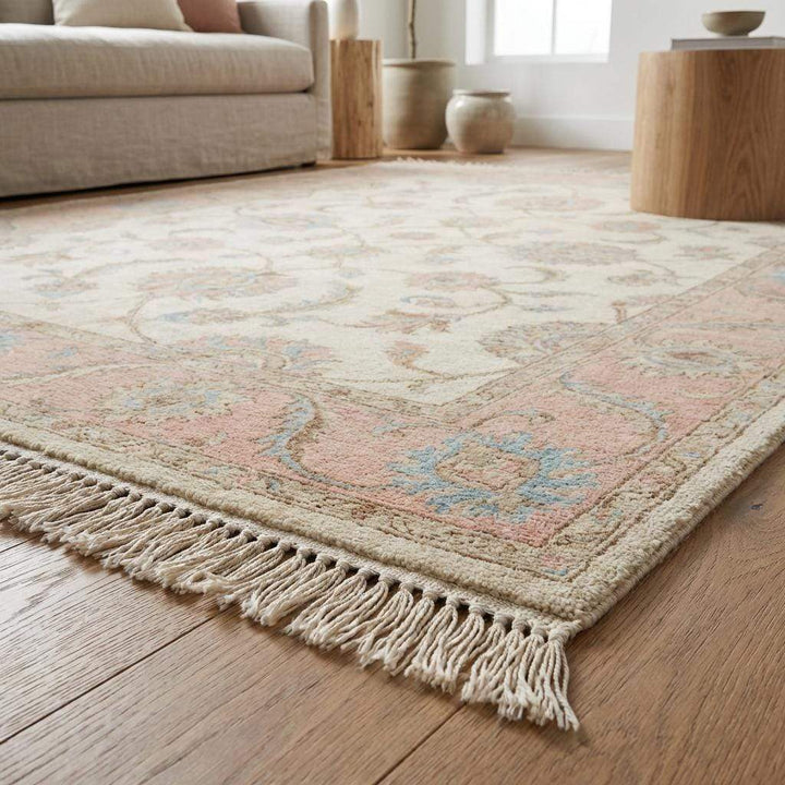 Translation missing: en.Rectangular hand knotted wool rug featuring soft medallion floral design and muted tones