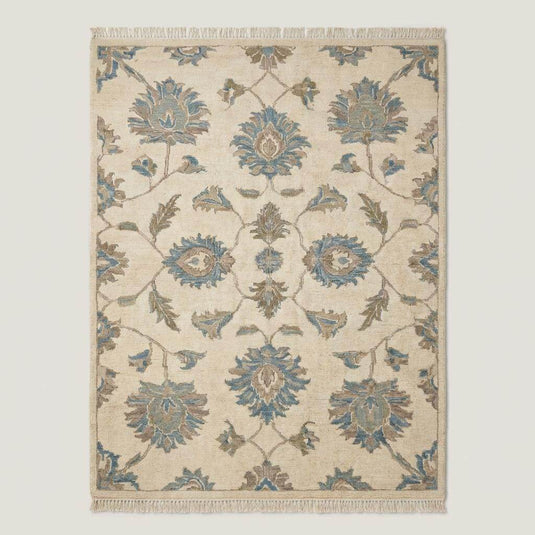 Translation missing: es.Traditional floral Oushak area rug in muted blue and cream colors with handcrafted wool pile