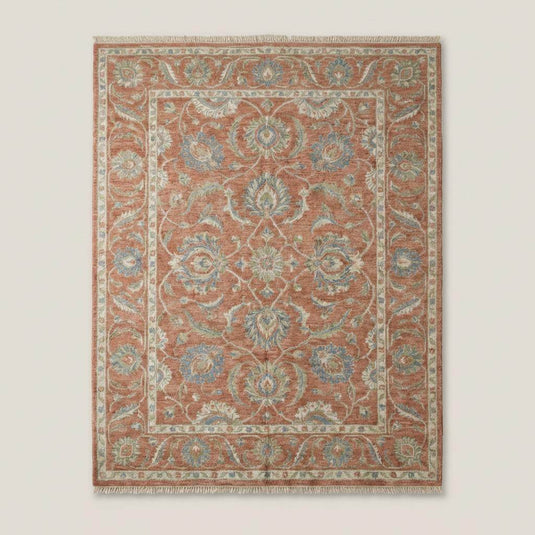 Translation missing: es.Traditional floral hand knotted wool rug styled in living room with warm neutral décor