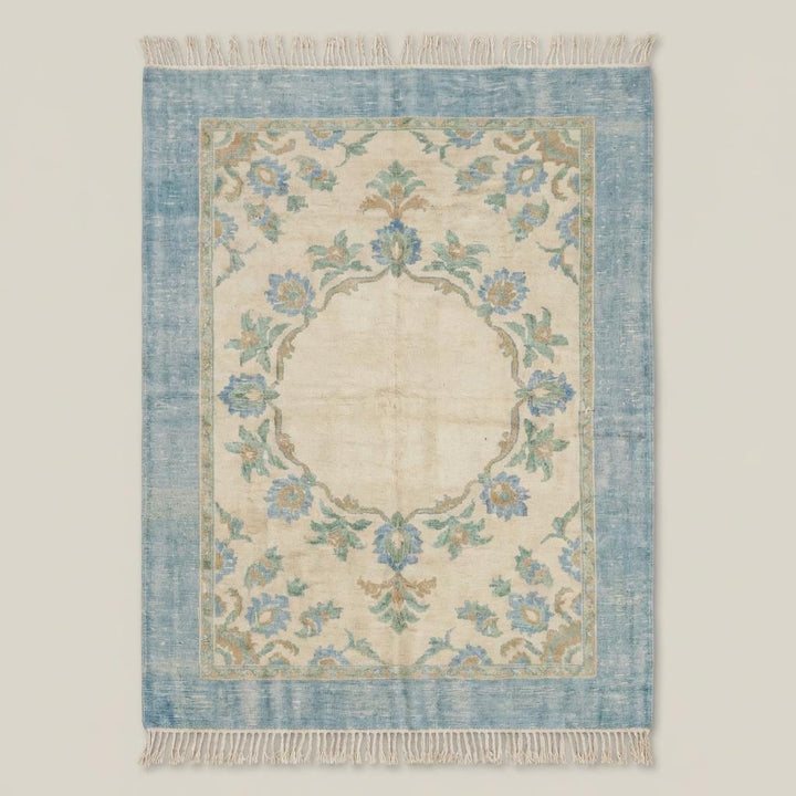 Translation missing: es.Traditional Turkish style wool area rug with ivory field and muted sage floral motifs