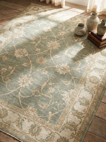 Translation missing: es.Hand knotted Oushak wool rug with sage green floral design and low pile texture