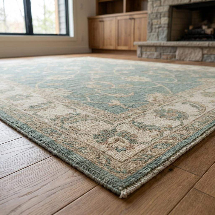 Translation missing: en.Low pile wool area rug with floral vines and artisan woven details