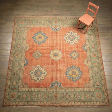 Translation missing: en.Hand knotted wool Oushak rug with traditional floral design for living room decor