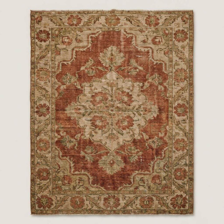 Translation missing: es.Vintage style Oushak area rug featuring floral medallion and soft distressed finish