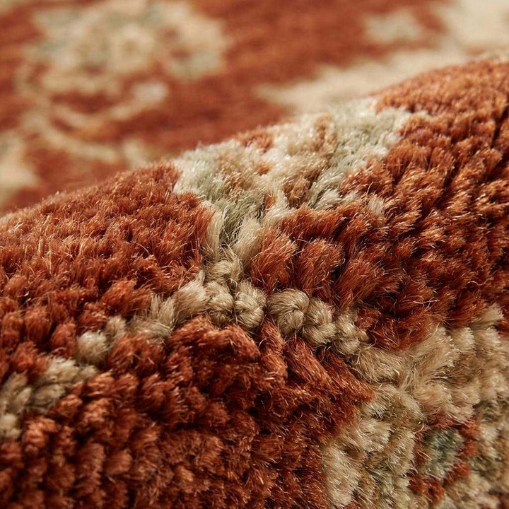 Translation missing: en.Close-up of hand knotted wool pile showing individual knots and natural fiber texture
