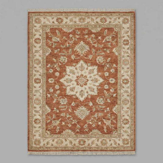 Translation missing: es.Living room styled with hand knotted wool area rug on dark wood flooring