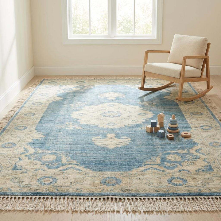 Translation missing: en.Designer hand knotted wool carpet adding soft antique elegance to contemporary home space