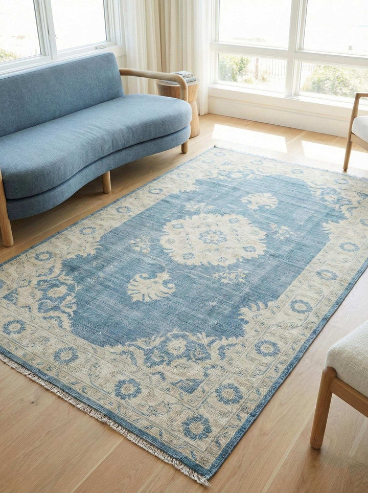 Translation missing: fr.Hand Knotted Oushak Wool Rug in vintage blue with floral medallion design for living room decor