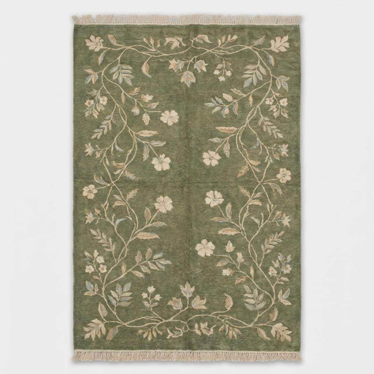 Translation missing: es.Floral hand knotted wool area rug with ivory and muted blue botanical details